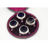 Cased Set of Four Victorian S/S Circular Salts with beaded rims on shell topped legs with hoof feet,