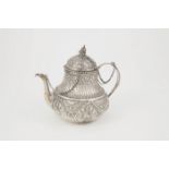 C18th Dutch Silver Bachelors Teapot baluster form, the dome lid with 2 chains, embossed thistle