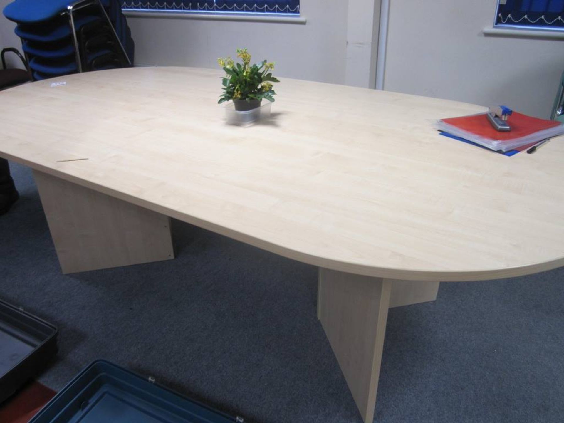 Light oak effect oval meeting table, approx 2400 x 1200mm