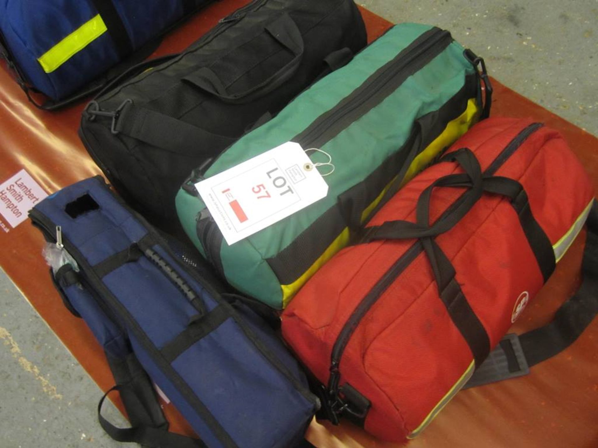 Five oxygen cylinder carry cases and consumable contents (cylinders removed)