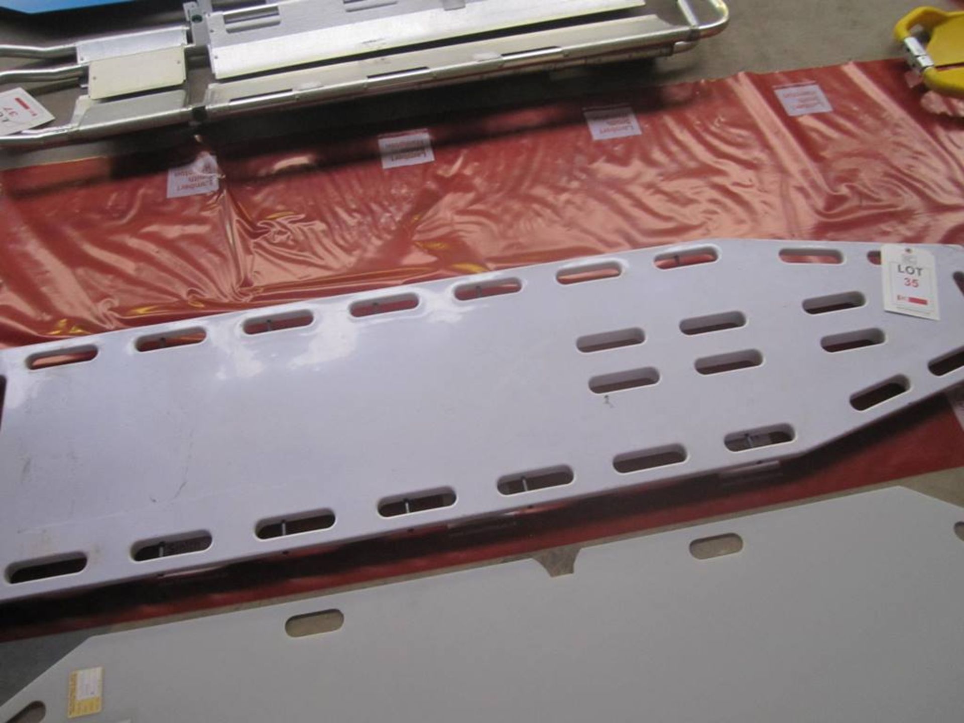 Spinal board with patient slider