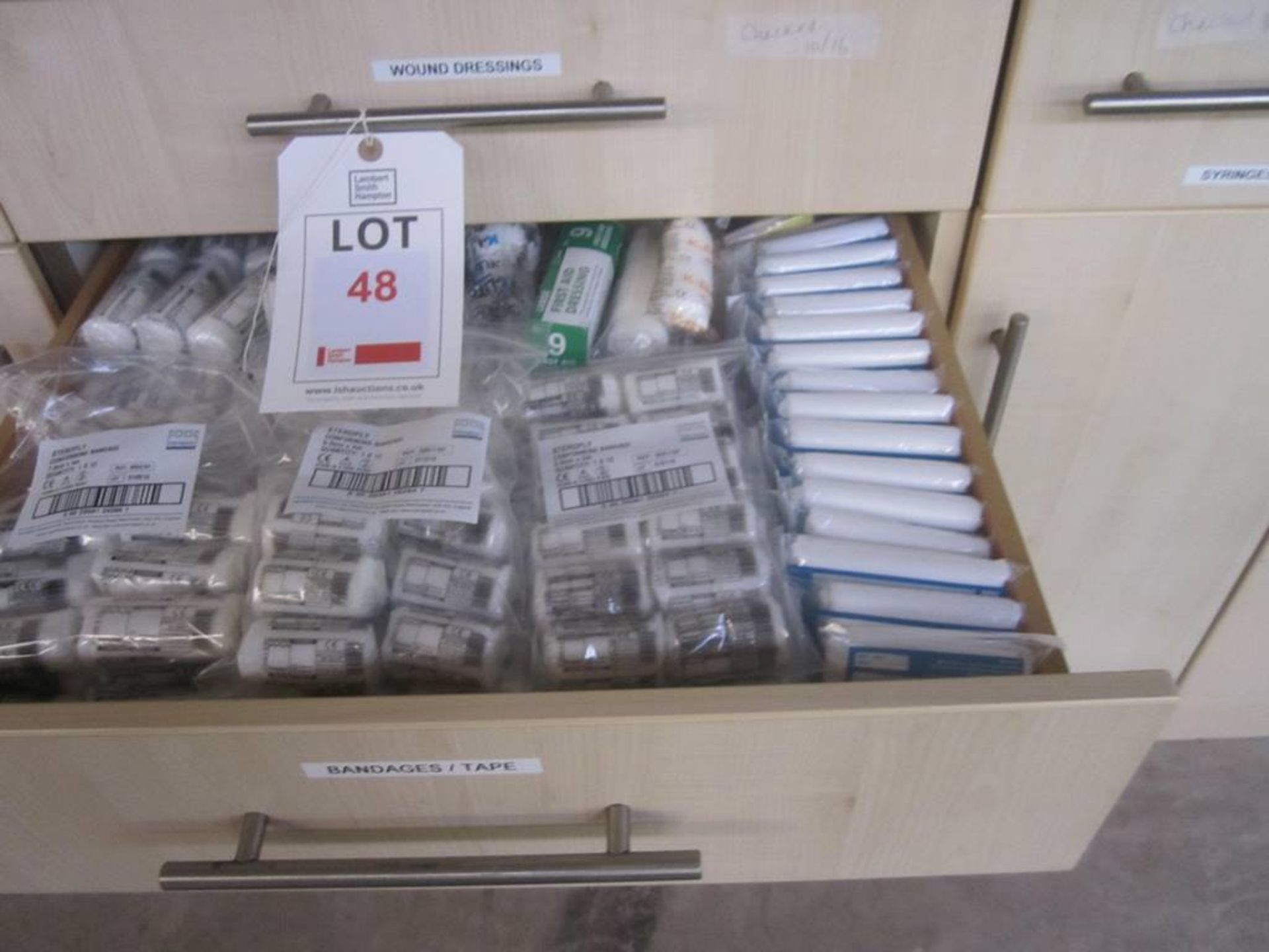 Loose contents of kitchen type cupboards, and wall units including medical consumable stock, i.e.