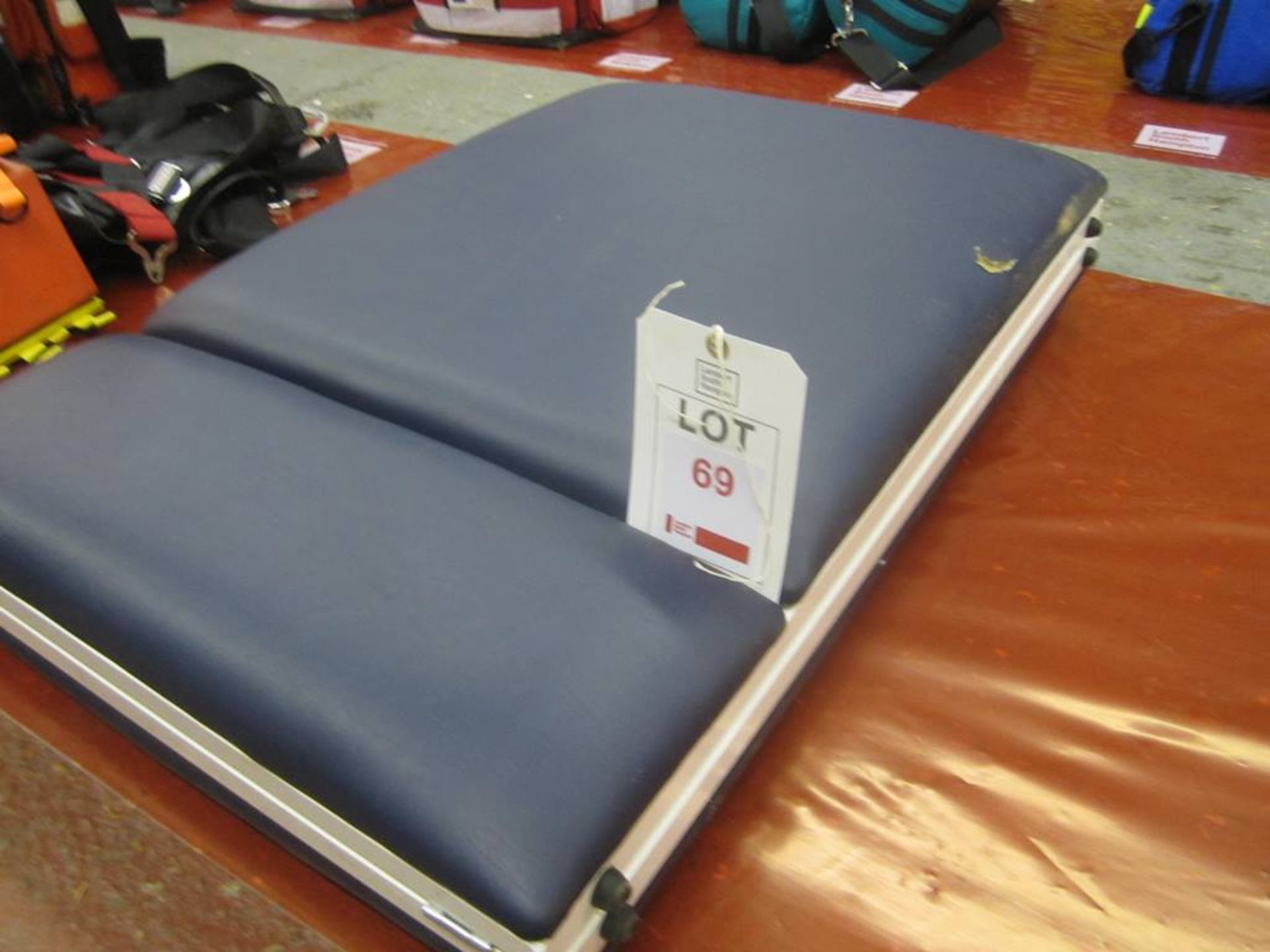 Vinyl upholstered steel frame folding padded patient bench