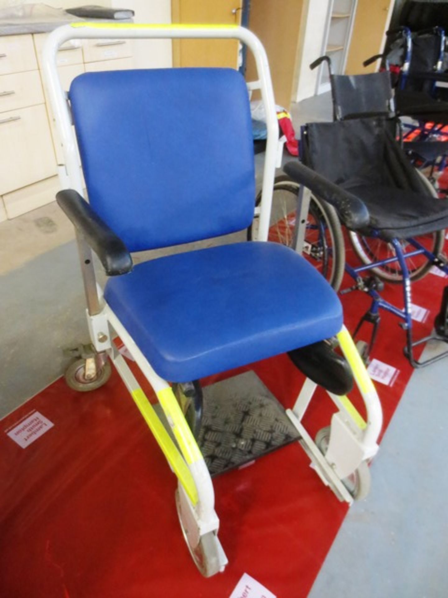 Unbadged wheelchair with leg supports