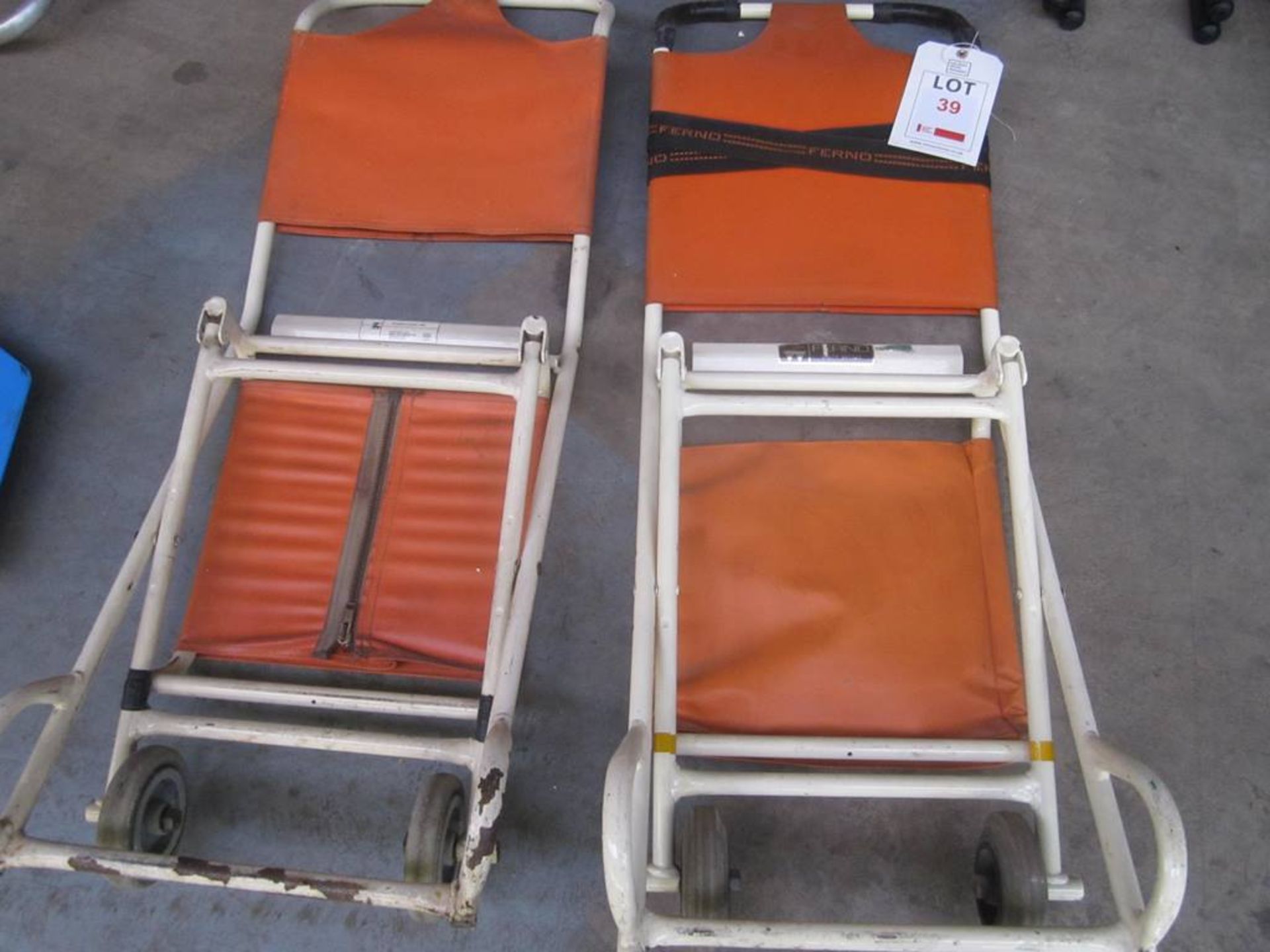 Two Ferno evacuation mobile chairs