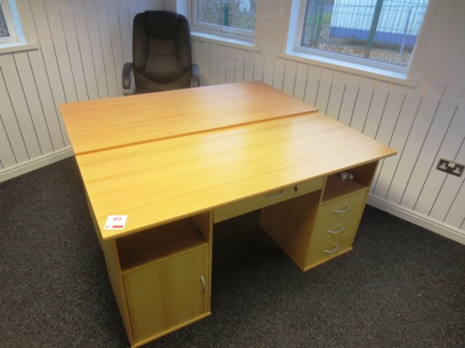 Two light oak effect 4 drawer/1 cupboard rectangular tables and one leather effect office chair