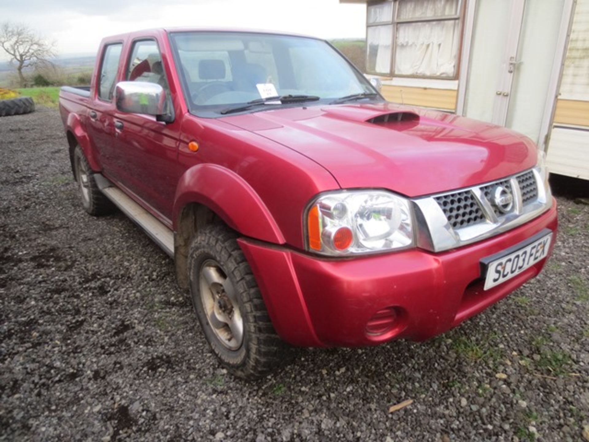 Nissan Pickup truck with crew cab, Reg: SC03 FEX, Recorded: 102529 miles. Used as off road farm