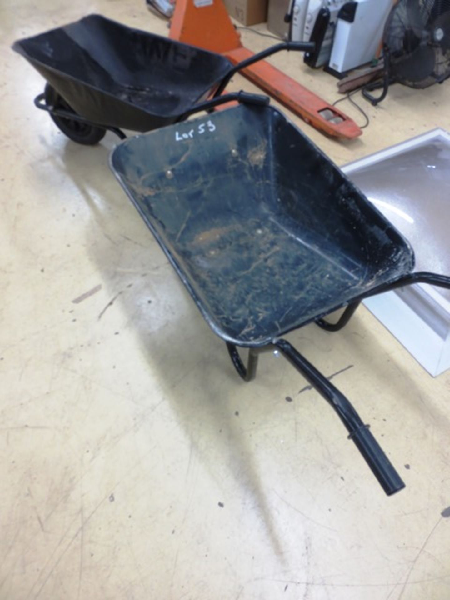 Two assorted wheelbarrows