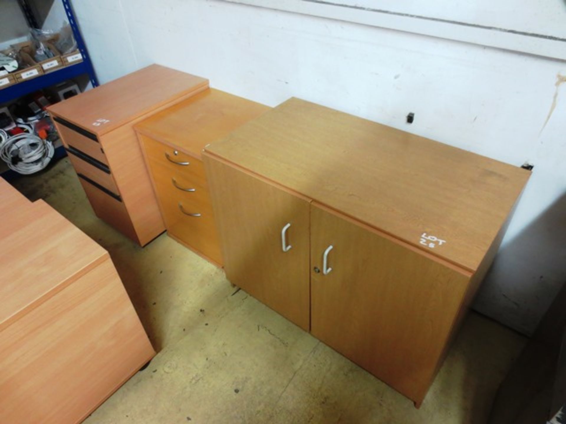 Two light oak effect 3 drawer pedestal units, light oak effect 2 door cabinet and light oak effect 3