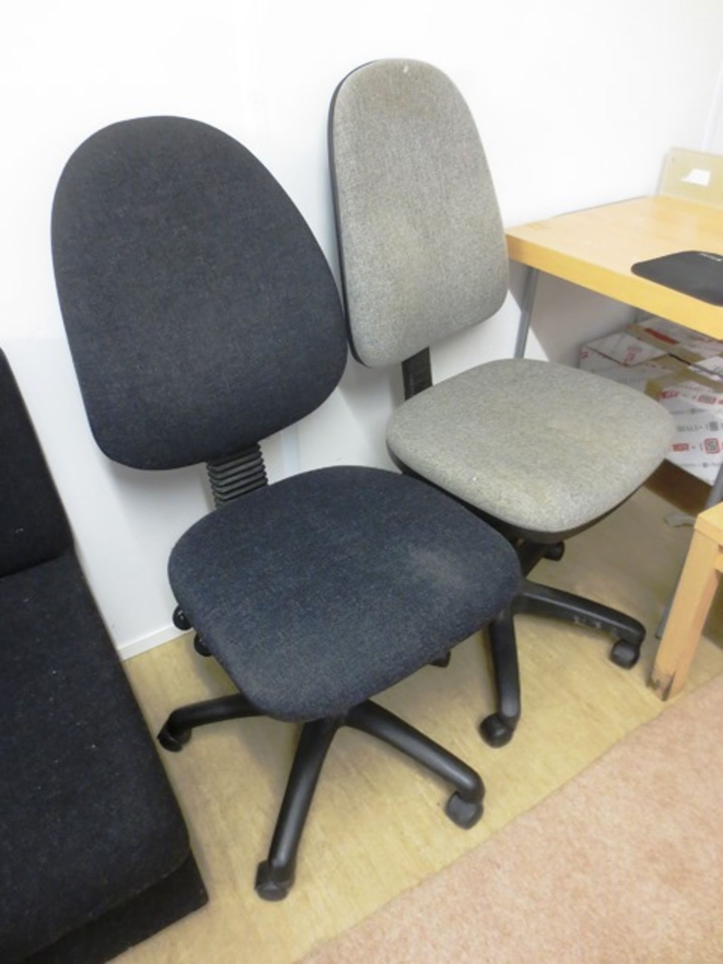 Two various cloth upholstered swivel chairs