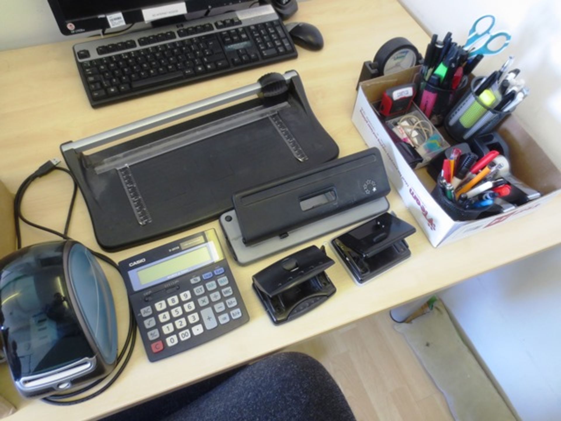 Assorted stationery and office equipment including: Dymo label printer, guillotine, envelopes,