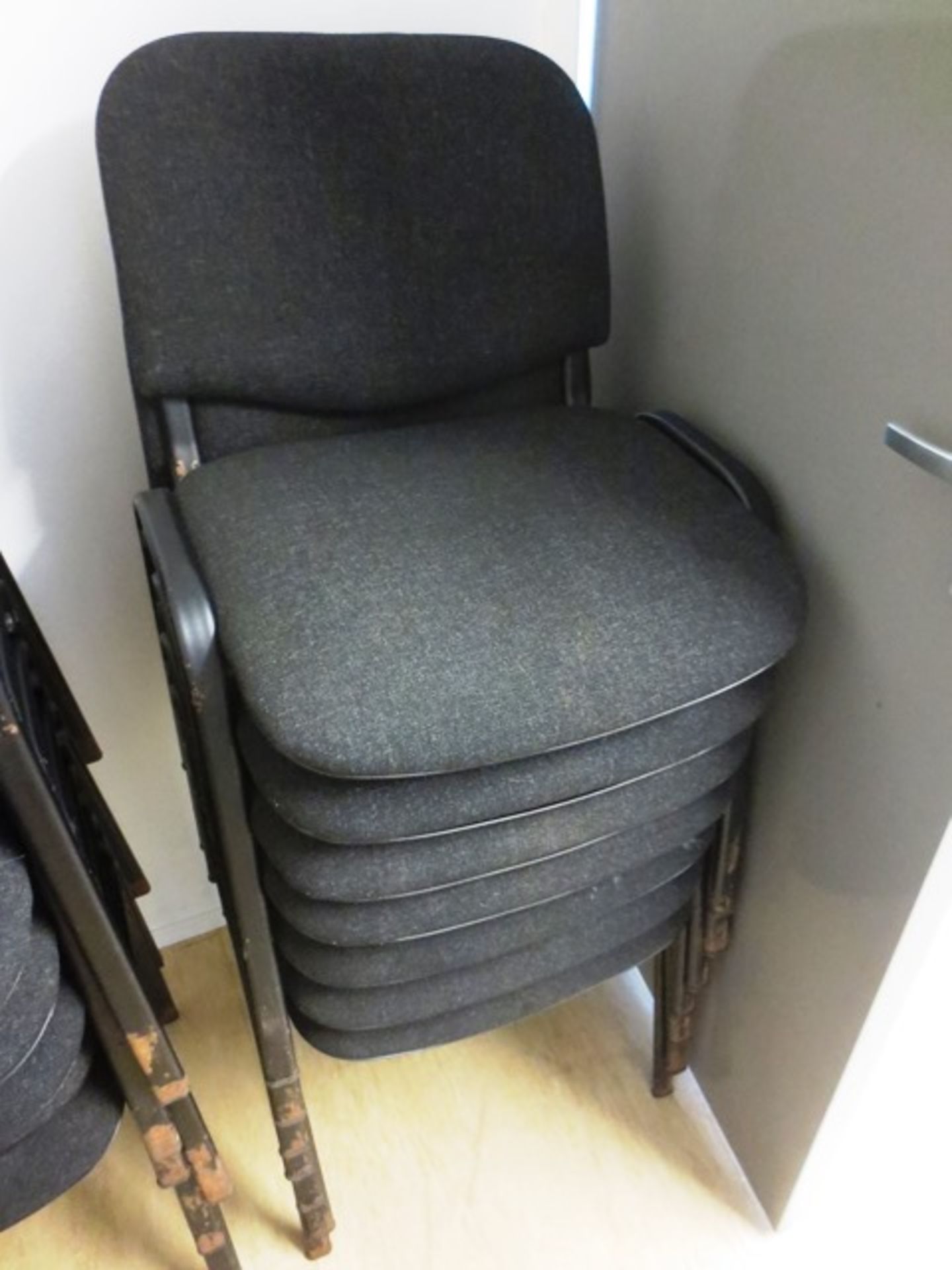 Seven grey cloth upholstered chairs