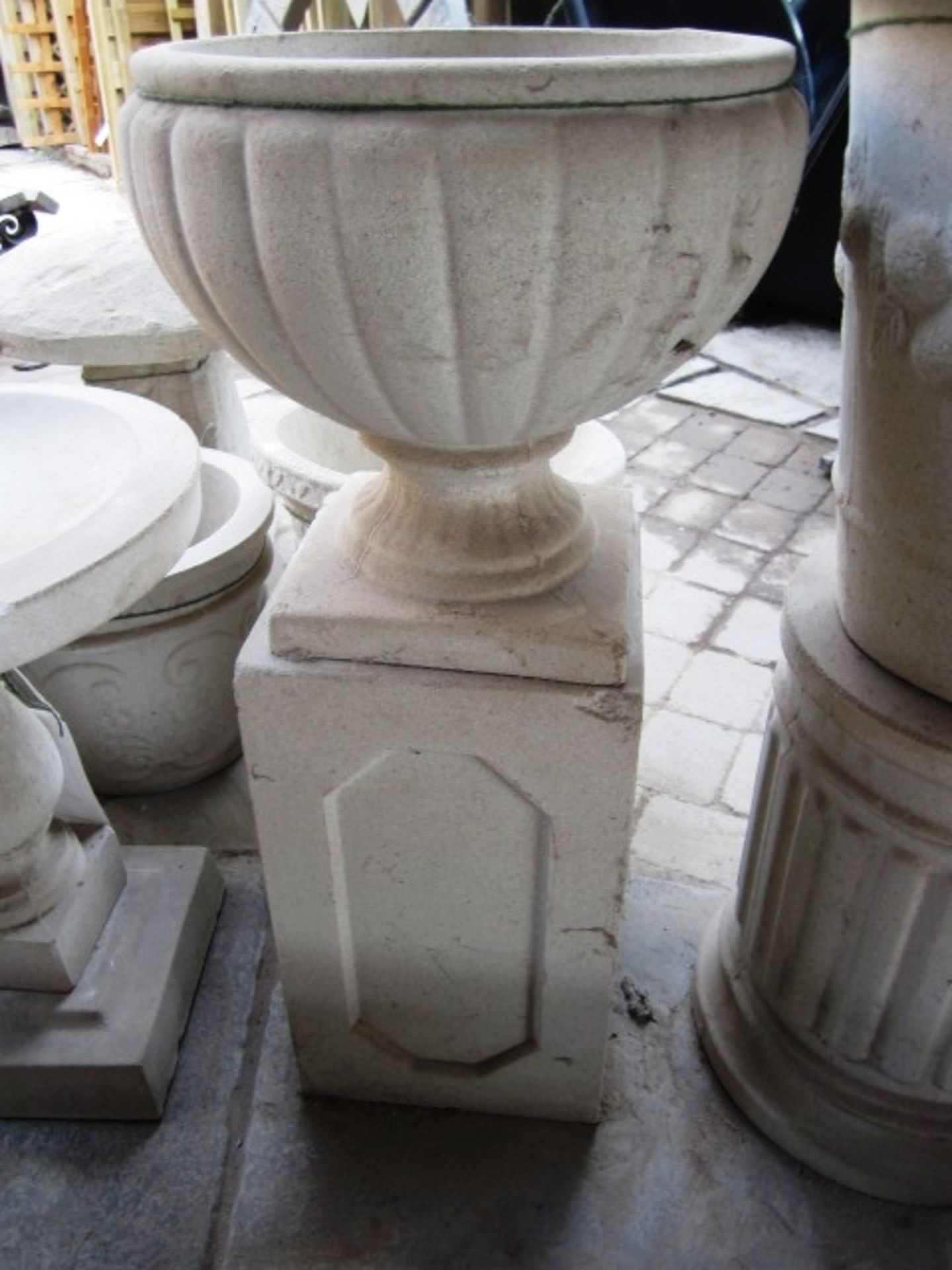 Reconstituted concrete stone 2-piece plinth and circular planter, approx. dimensions: height 790mm x