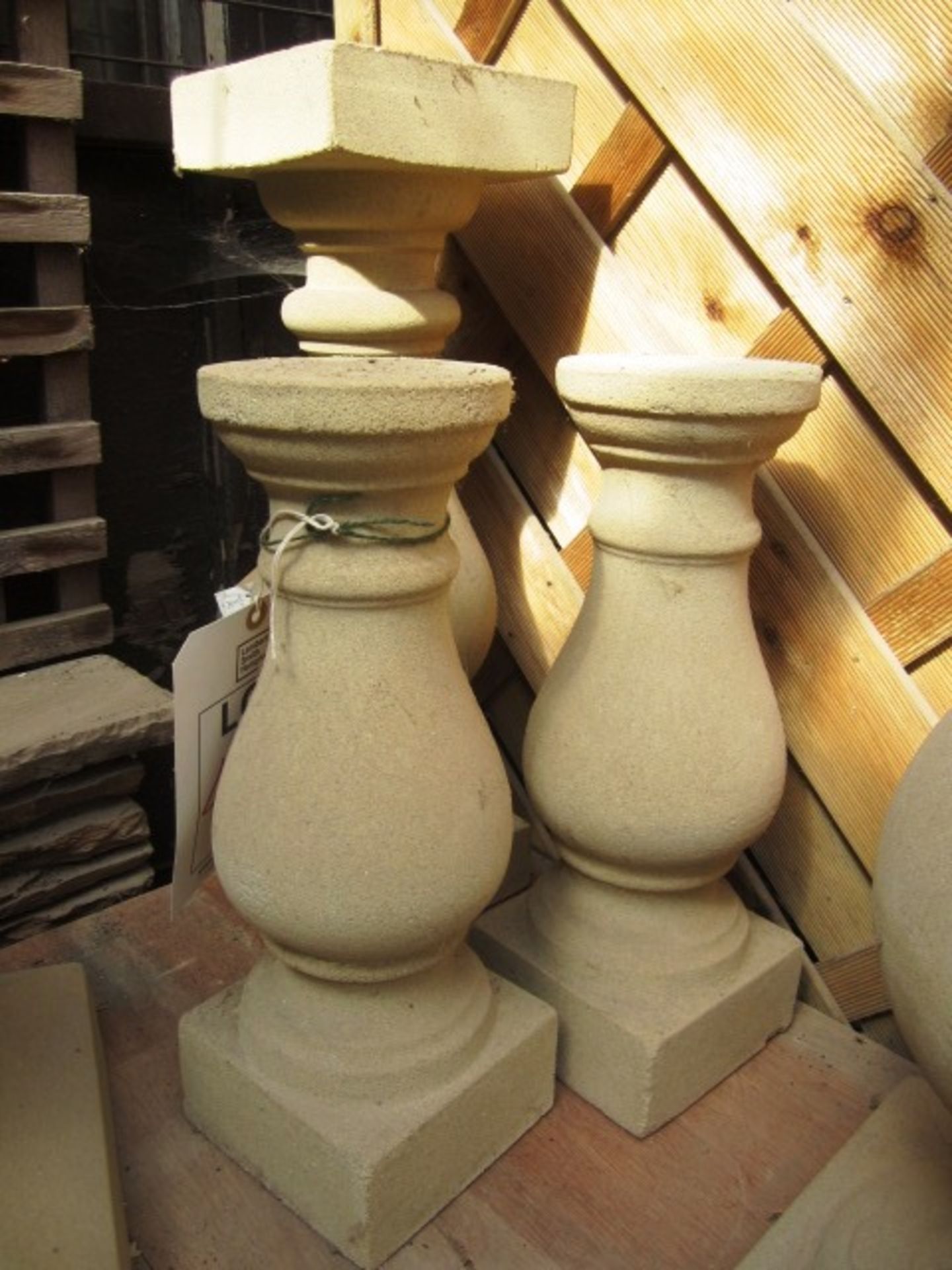 3 x reconstituted concrete stone spindle plinths, approx. dimensions: 2 x 390mm / 1x 530mm, colour