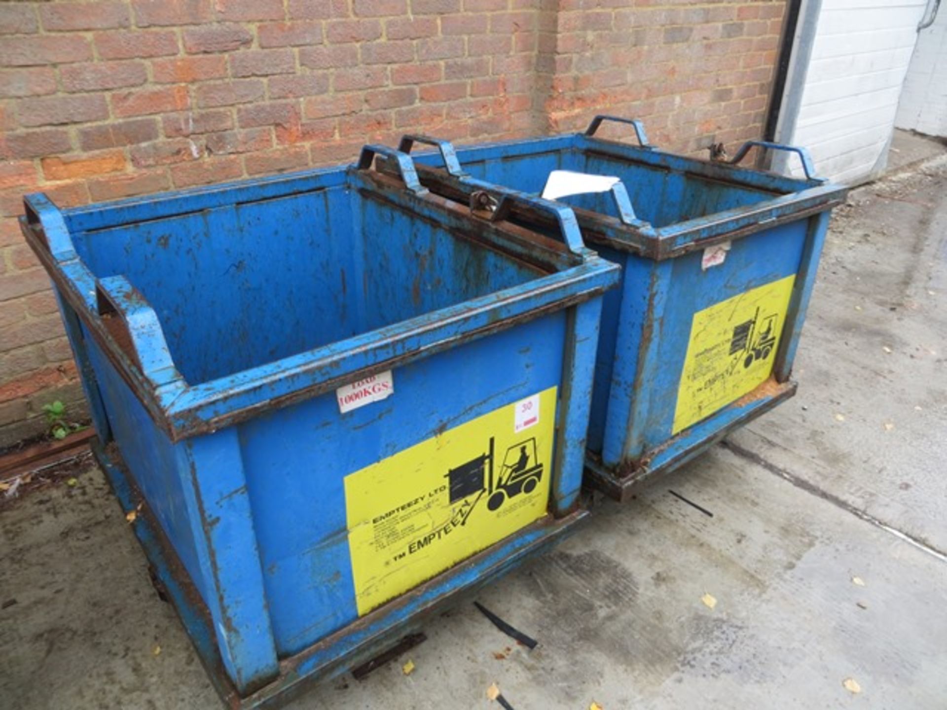 Two Empteezy metal mobile forkliftable 1000Kg dump bins