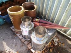 Contents of pallet, to include chimney pots, stainless steel surrounds, steel fence post supports,