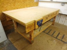 Timber framed work bench with attached bench vice