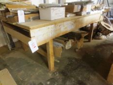 Two timber frame workbenches, approx 1220 x 2440 and 3800 x 1000, with mounted vice (Please note: