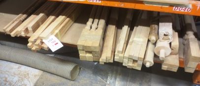 Contents of shelf, to include assorted timber stair spindles/balastrade (as lotted)