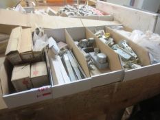 Five boxes of assorted stock including emergency exit handles, sash pulleys, panel supports, etc.