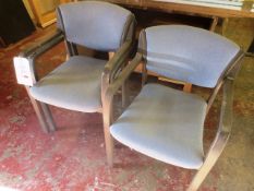 Three blue cloth upholstered chairs, with arms