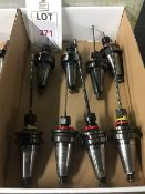 Twenty four BT40 taper shank tool holders, fitted tooling, in three boxes