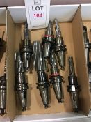 Seventeen BT40 taper shank tool holders, fitted tooling, in two boxes