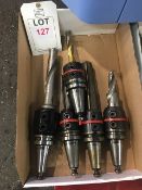 Four BT40 taper shank tool holders, fitted tooling, in one box