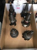 Six BT40 taper shank tool holders, fitted insert tip milling heads, in one box