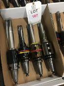 Four BT40 taper shank tool holders, fitted tooling, in one box