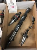 Three BT40 taper shank tool holders, fitted tooling, in one box