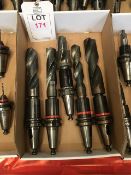 Thirteen BT40 taper shank tool holders, fitted tooling, in two boxes