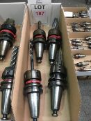 Ten BT40 taper shank tool holders, fitted tooling, in three boxes