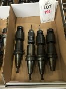 Twelve BT40 taper shank tool holders, fitted tooling, in two boxes