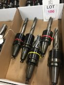 Four BT40 taper shank tool holders, fitted tooling, in one box