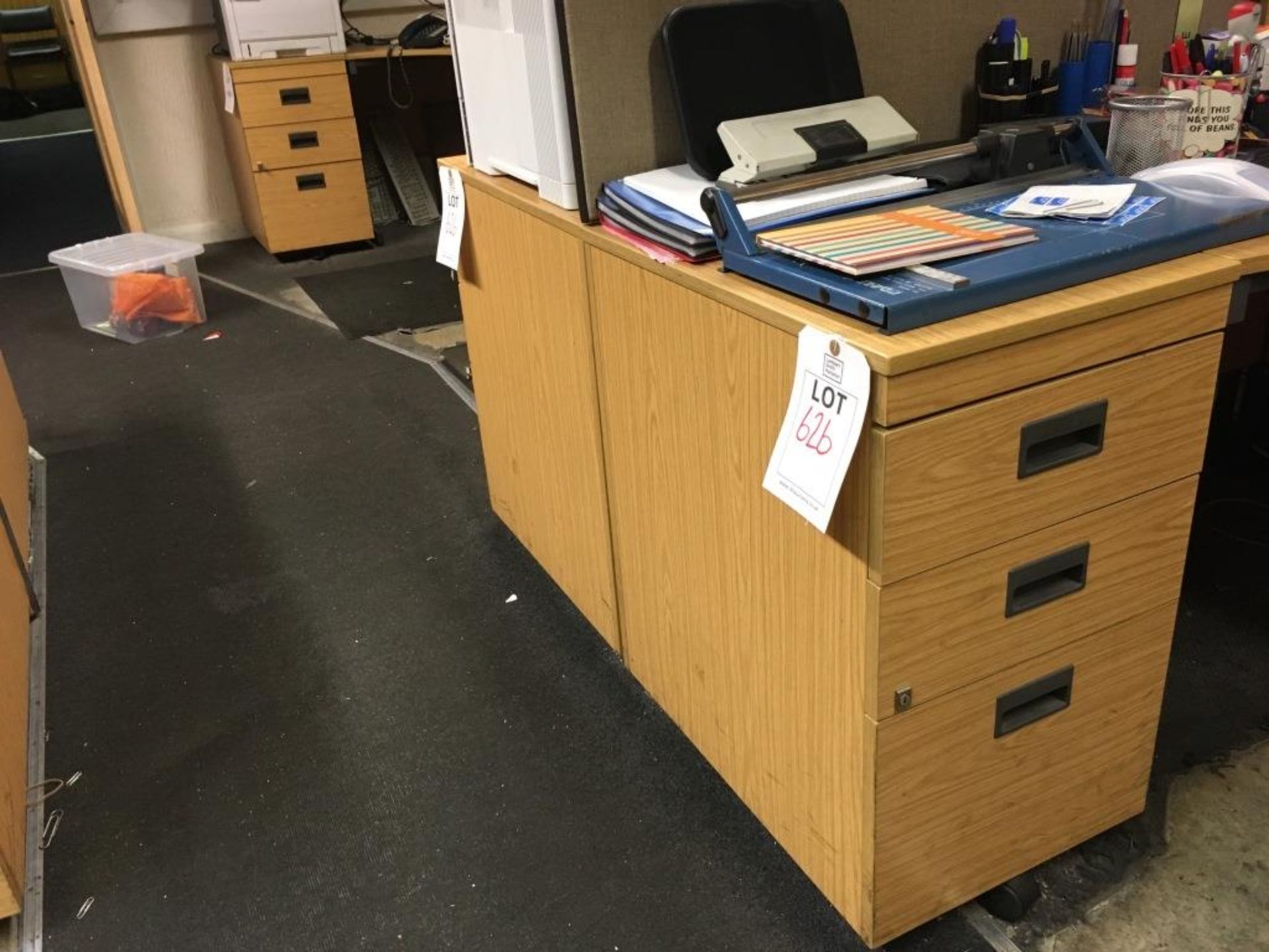 Three 3-drawer wood veneer pedestals (Please note: All items on the first floor will require