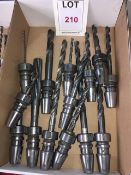 Forty taper shank tool holders, fitted tooling, in three boxes