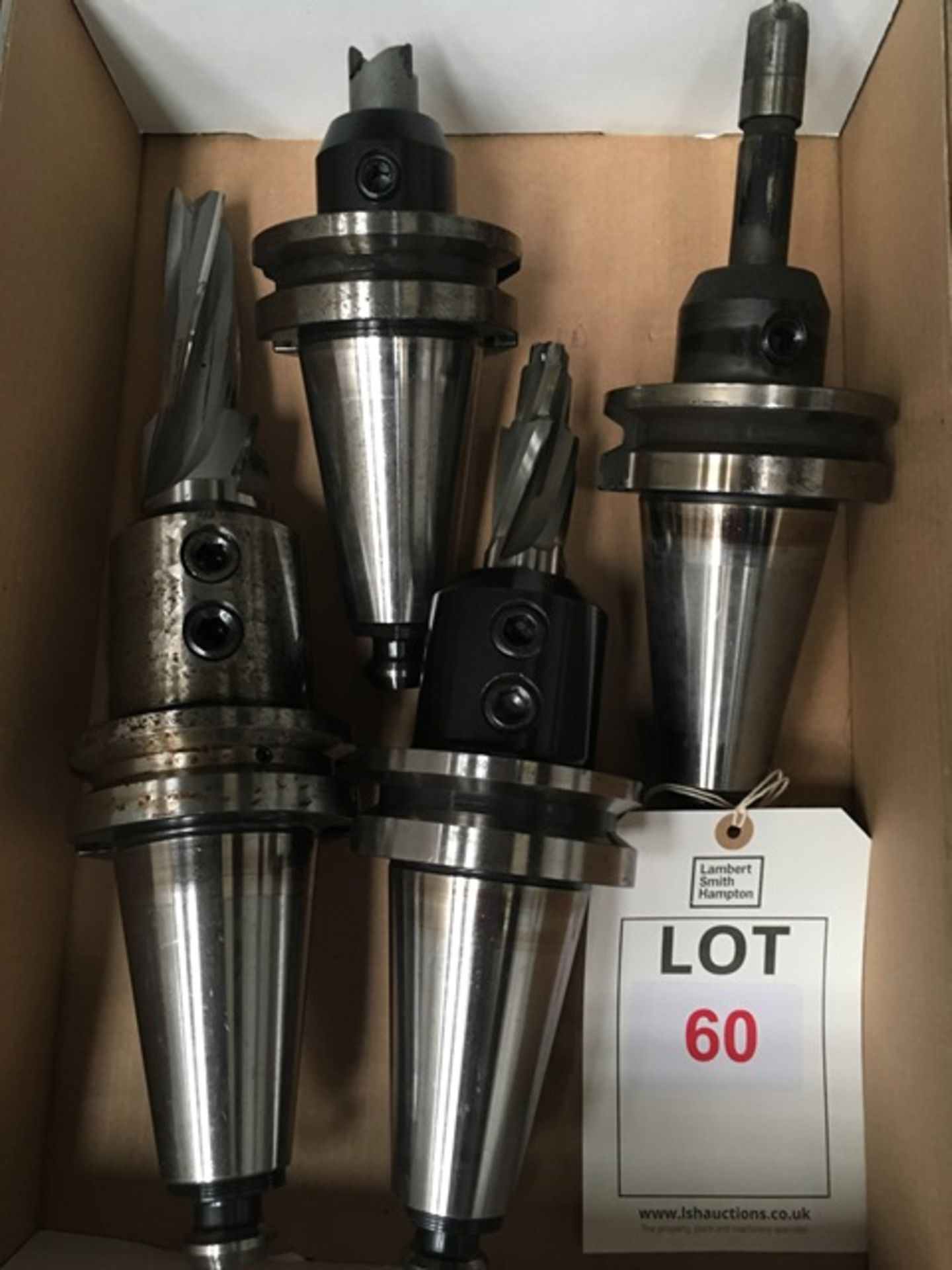Four BT50 taper shank tool holders, with fitted tooling in one box