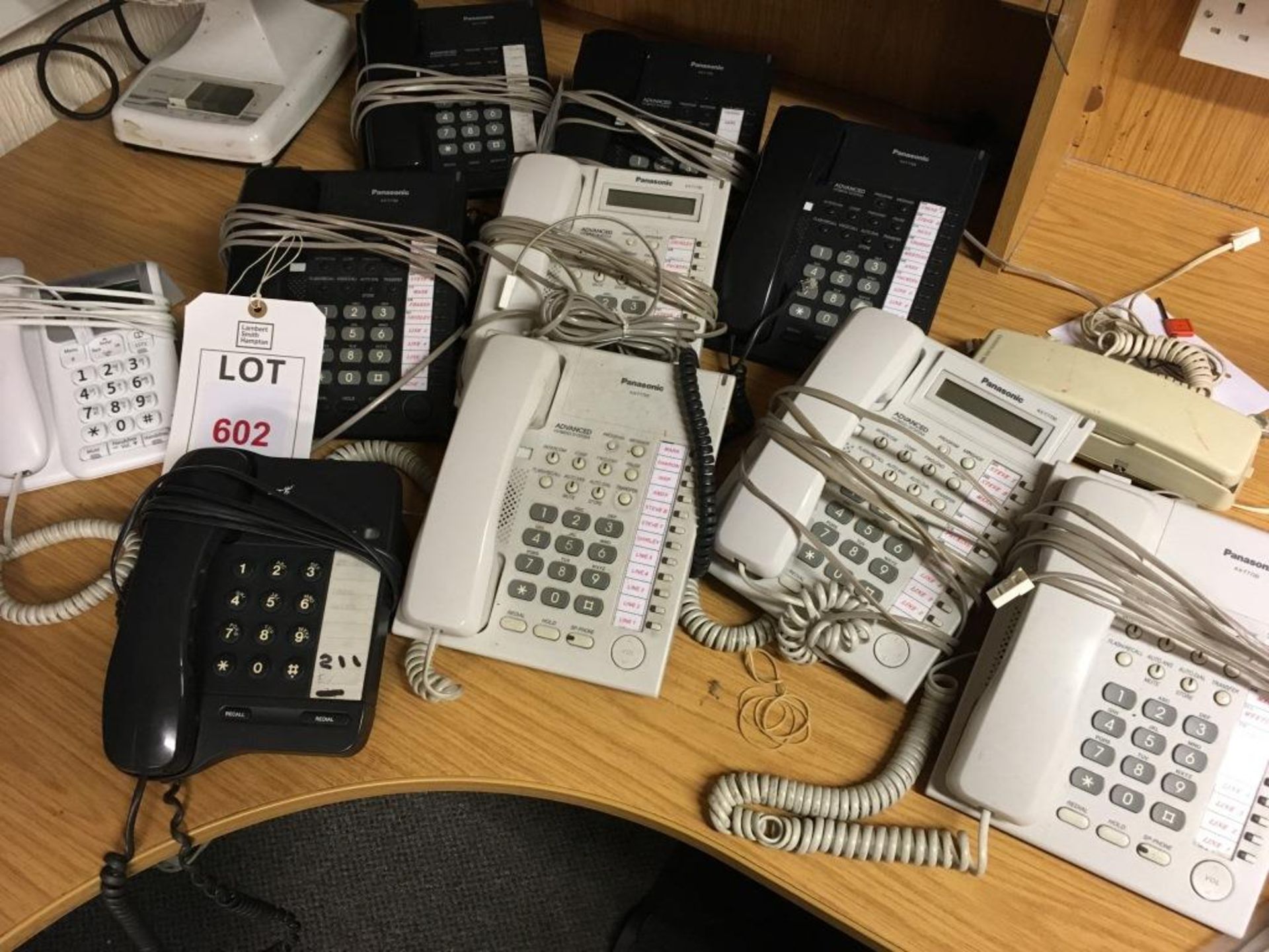 Eleven assorted telephones