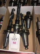 Seven BT50 taper shank tool holders, with fitted tooling in two boxes