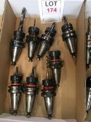 Eight BT40 taper shank tool holders, fitted tooling, in one box
