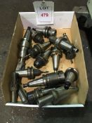 Twelve BT40 taper shank tool holders, fitted tooling and insert tip drill