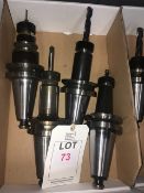 Four BT50 taper shank tool holders, with fitted tooling in one box