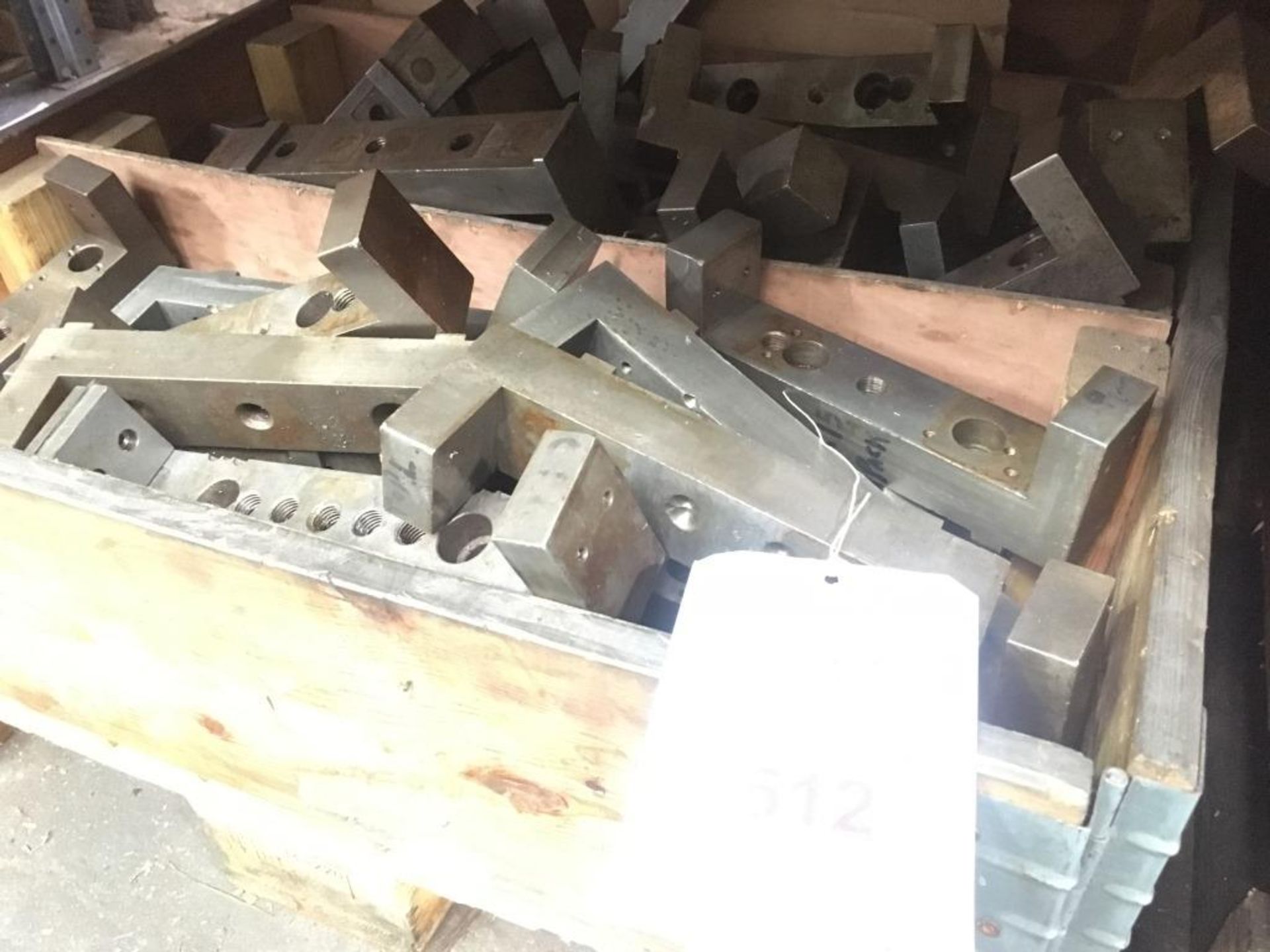 Assorted machining work fixtures, as lotted, four pallets