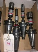 Four BT50 taper shank tool holders, fitted roller, in one box