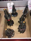 Six BT40 taper shank tool holders, fitted insert tip milling heads, in one box
