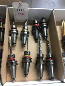 Thirteen BT40 taper shank tool holders, fitted tooling, in two boxes