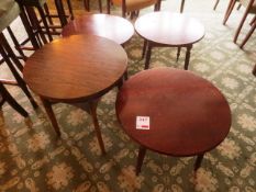 Four dark wood circular bar/coffee tables