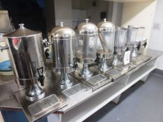 Seven assorted stainless steel, framed drinks dispensers (3 without lids)