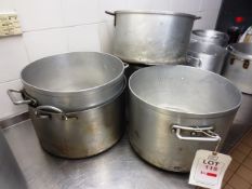 Five assorted stainless steel pots, ranging from 420mm dia